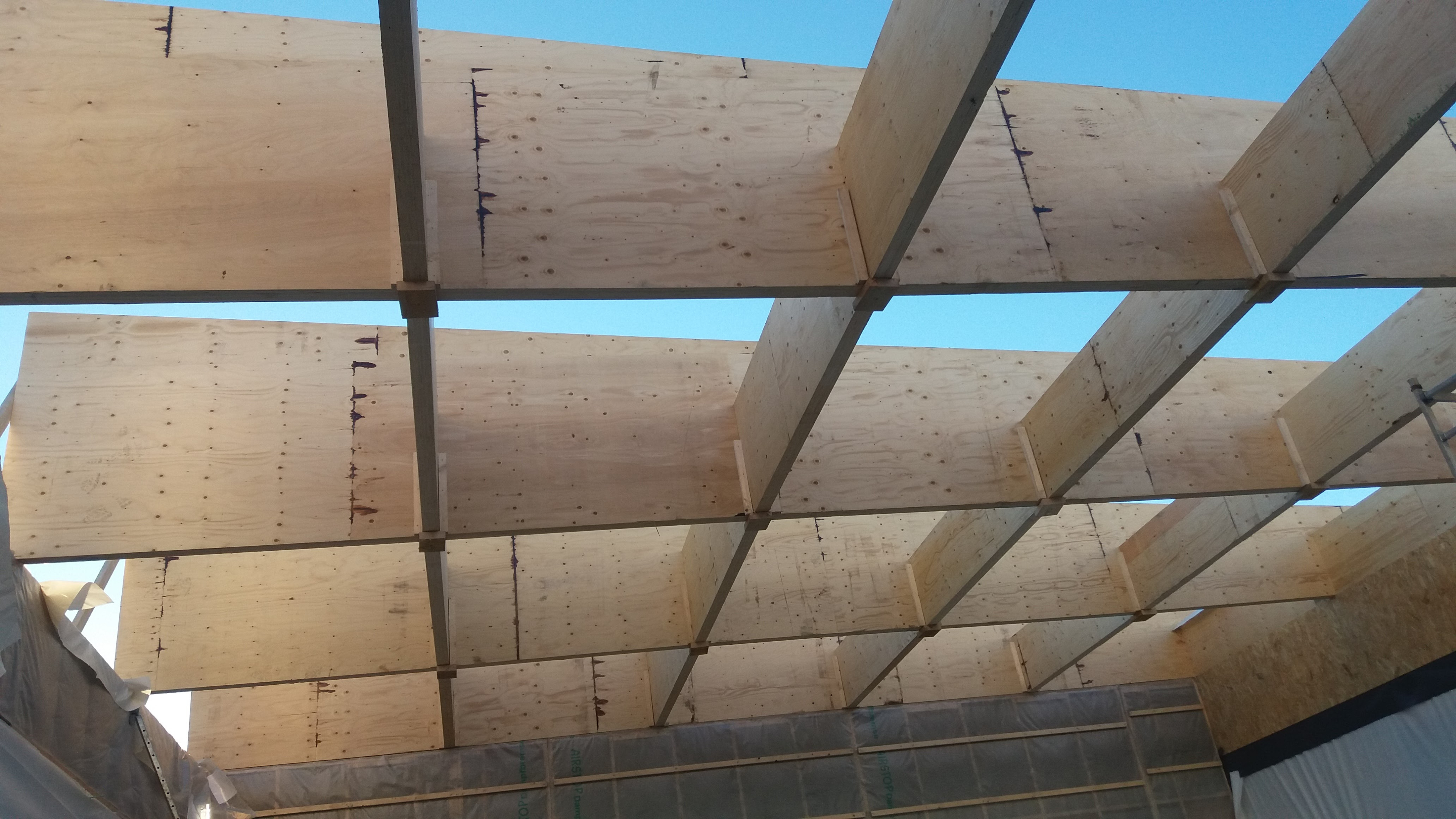 Maison_ossature_bois_charpente_construction_terrasse_design_artisan_pergolat_pool_house_couverture_4